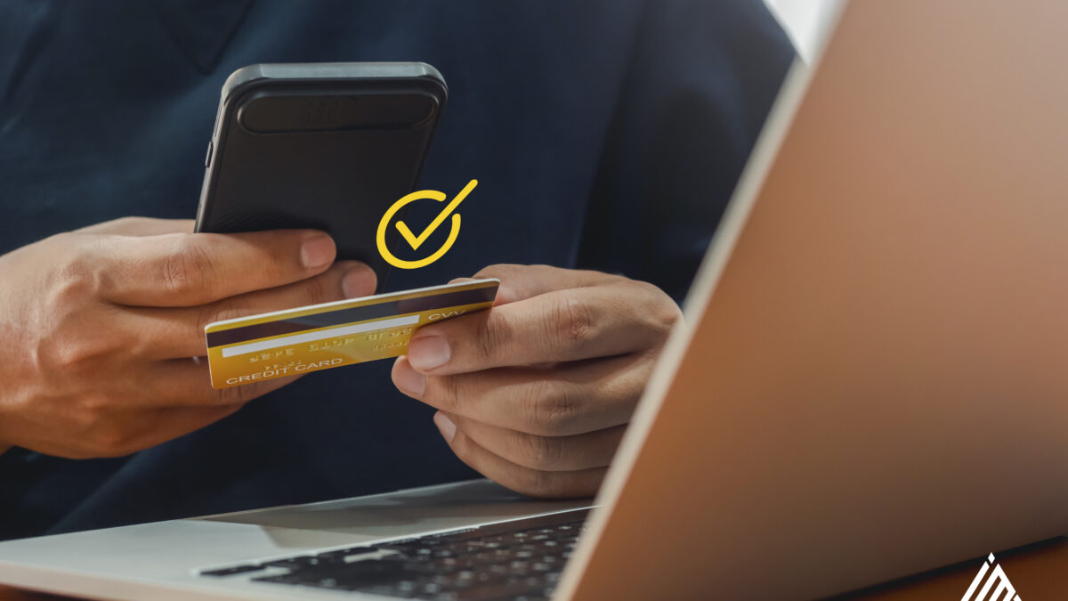 someone checking his credit card to purchase a certain service on an ecommerce website