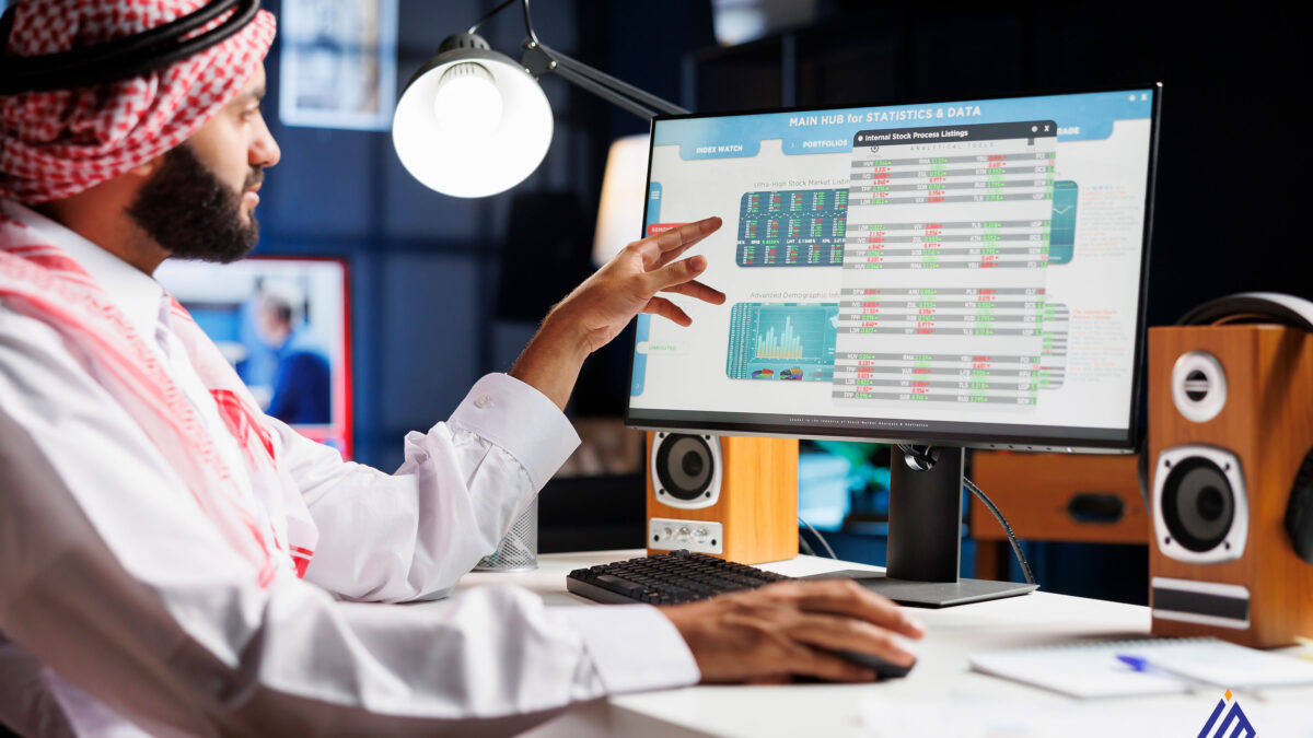 Saudi business owner planning how much it costs to open a website